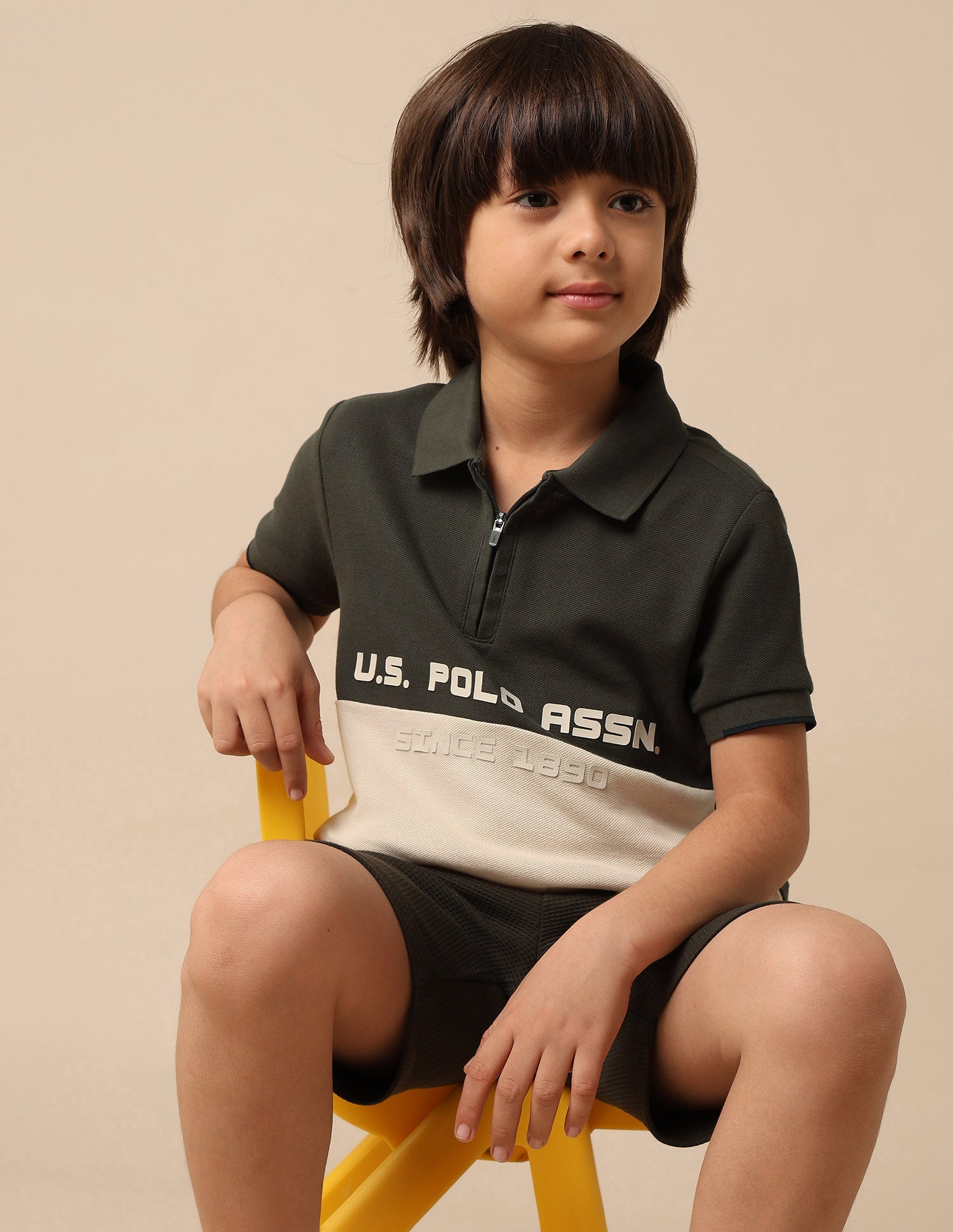 Boys Colour Blocked Brand Embossed Polo Shirt