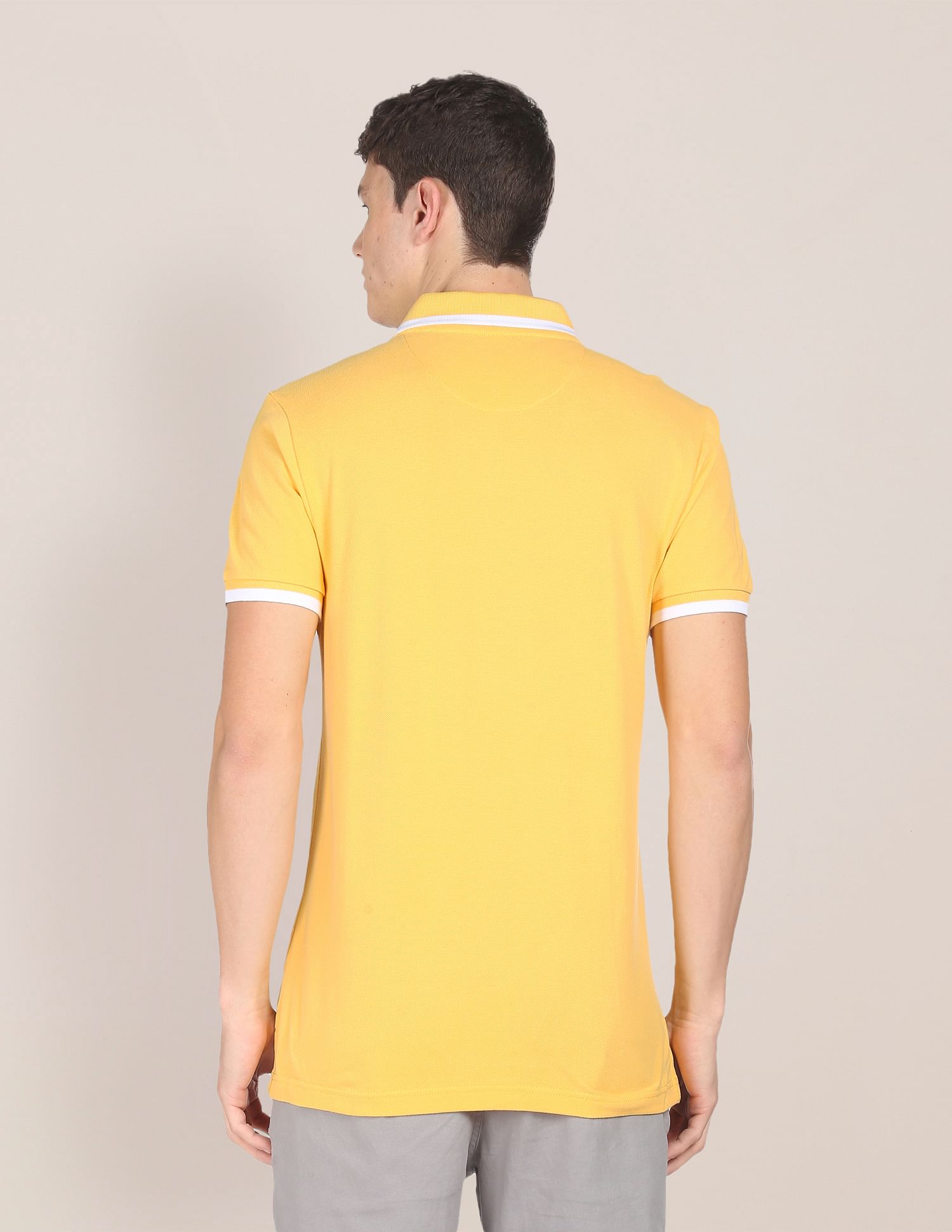Men Yellow Cotton Solid Polo Shirt Yellow - U.S. Polo Assn. India | Large