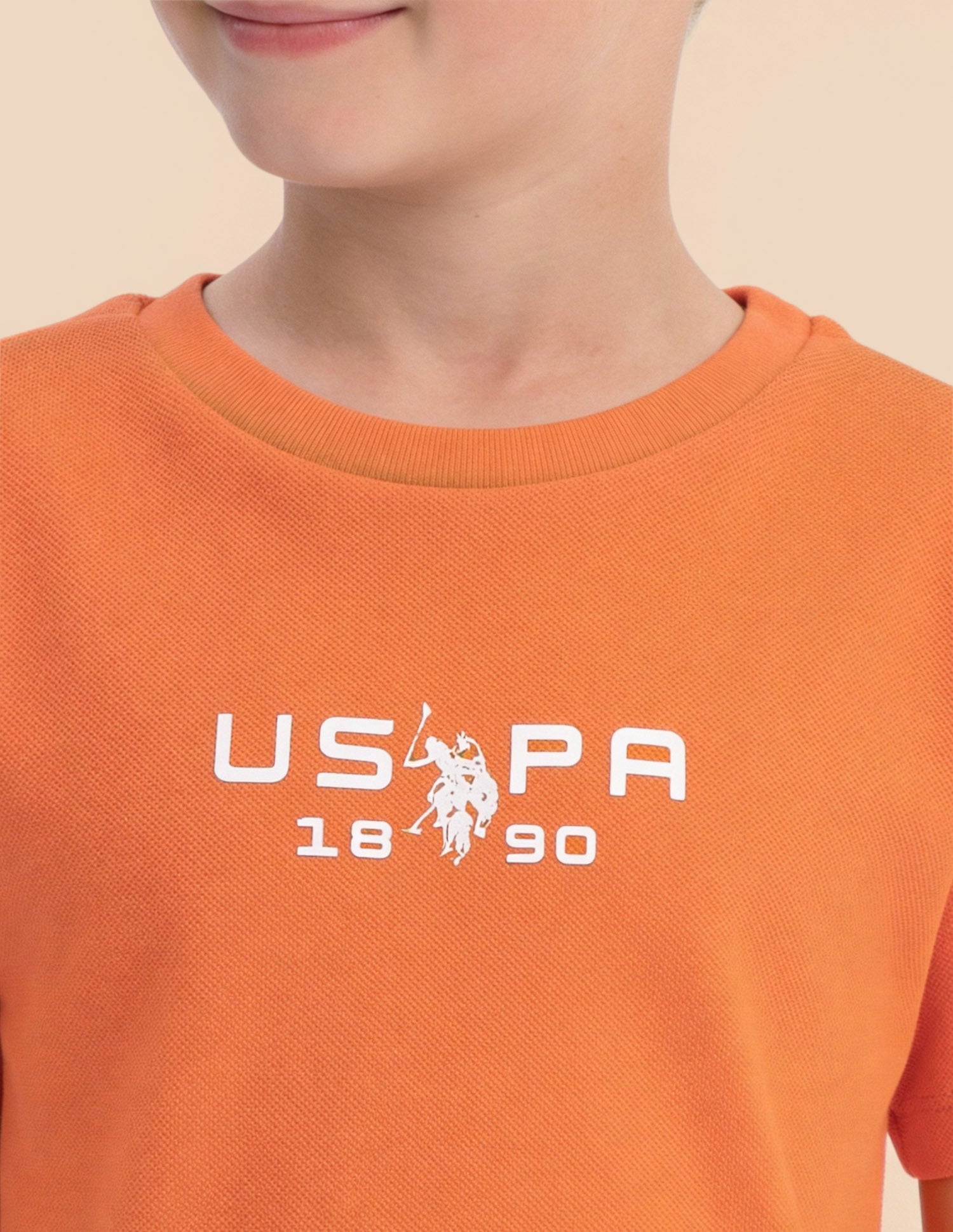 Boys Solid Regular Fit T-Shirt Orange - U.S. Polo Assn. India | Large