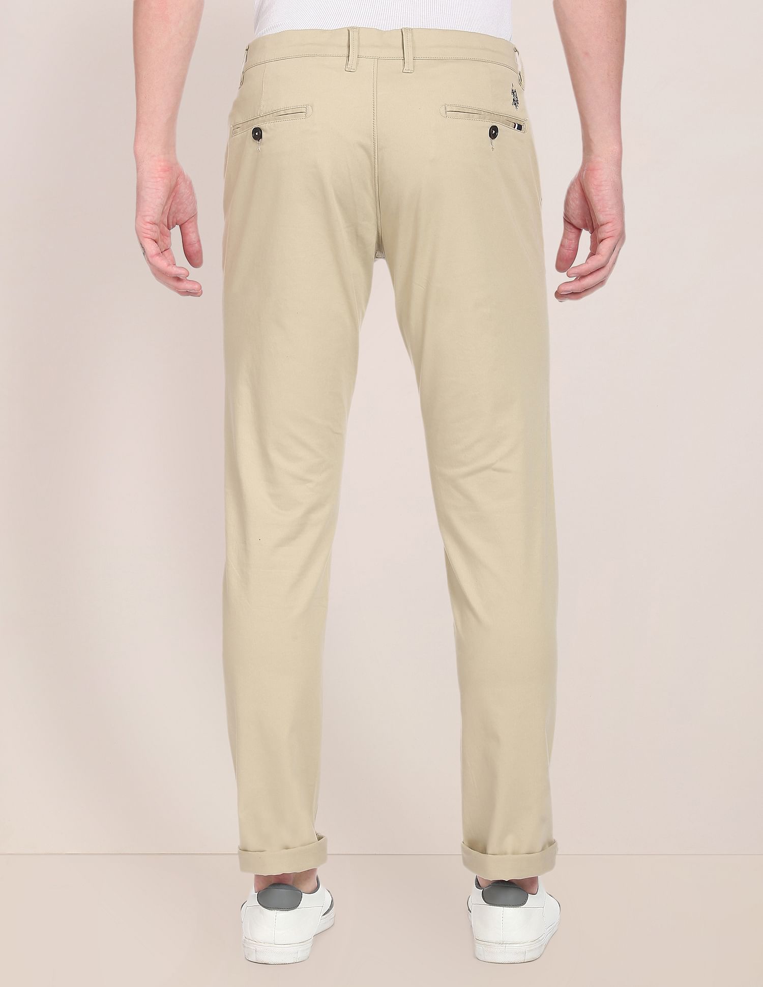 Men Beige Mid Rise Flat Front Solid Trousers – U.S. Polo Assn. India